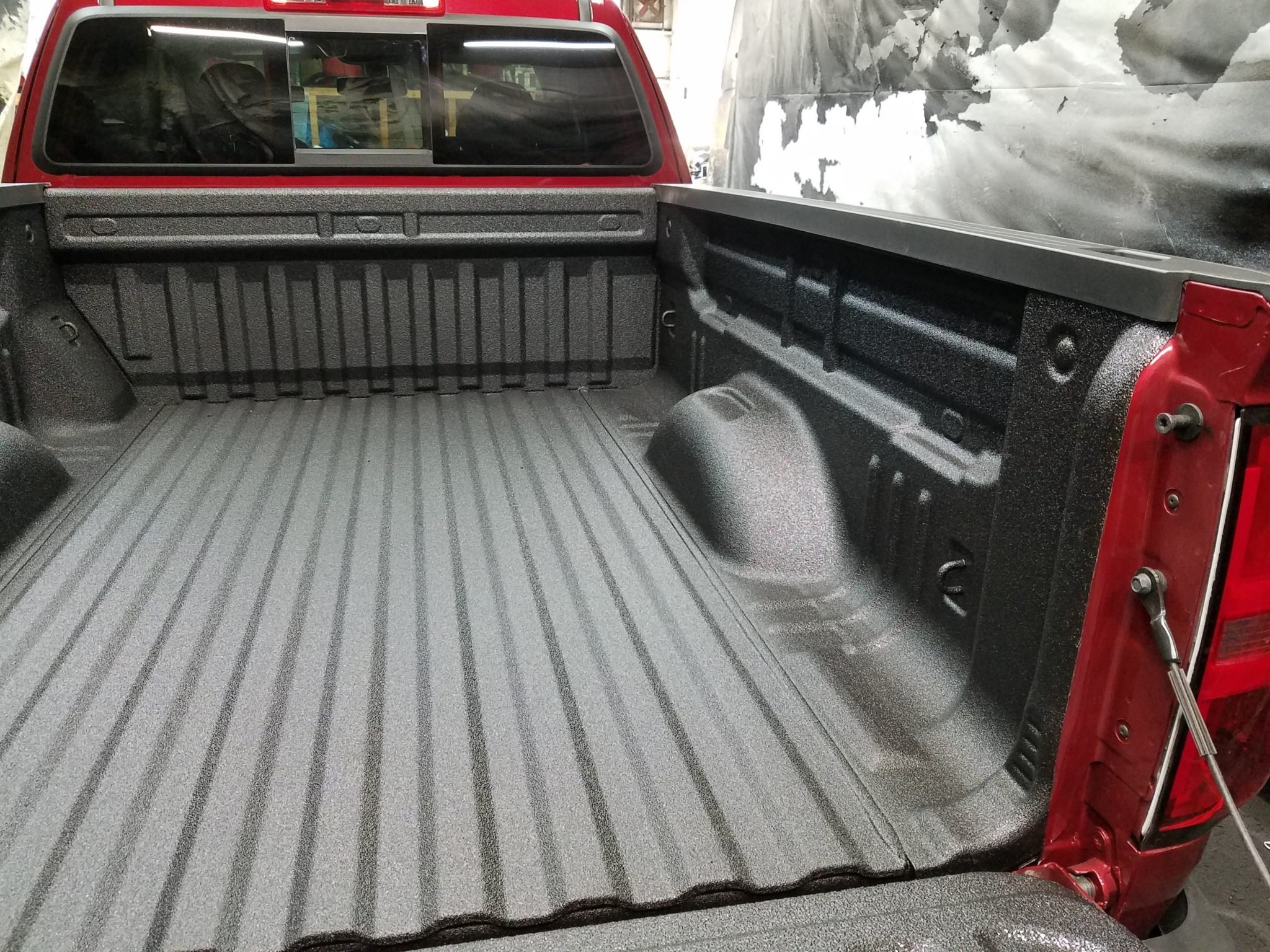 back of a red pickup truck