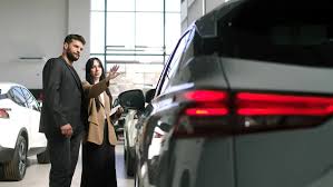 SUV owner speaking with an Automotive Protection Services team member in Fairfax, Virginia about vehicle protection services