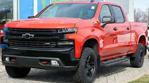 Brand new red pickup truck representing new truck buyers in Fairfax Virginia