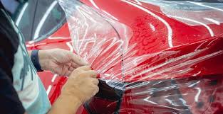 Red hood protected with paint protection film