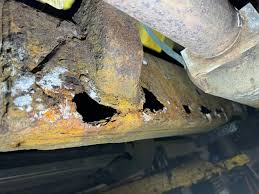 Frame access holes used for cavity wax protection