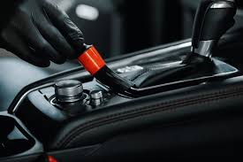 Interior detailing brush cleaning hard-to-reach vehicle surfaces
